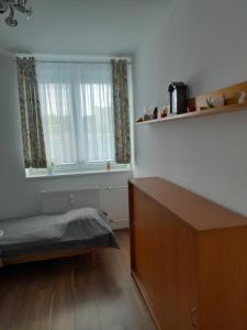 Postel nebo postele na pokoji v ubytování Apartment in the heart of Myjava Town