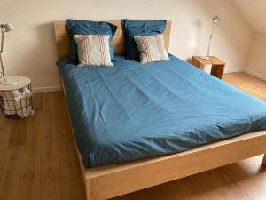 Postel nebo postele na pokoji v ubytování F1 Circuit 2Min 2 Rooms Stay