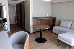 Posezení v ubytování Courtyard by Marriott Puebla Las Animas