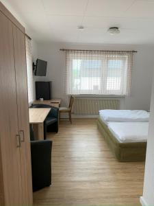 Postel nebo postele na pokoji v ubytování Gästehaus Fries