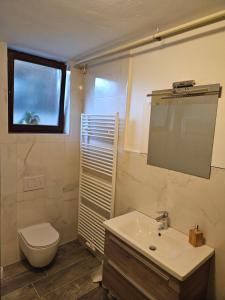 Koupelna v ubytování Apartma Vidmar + 8 fotografií