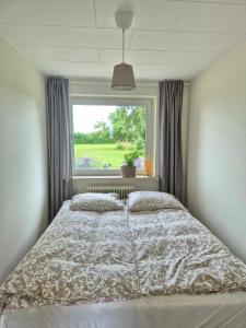 Postel nebo postele na pokoji v ubytování Apartment in Danmark- Agernaesgaard Otterup