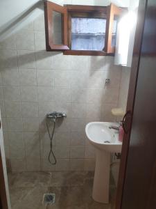 Koupelna v ubytování Aliki