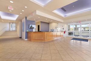 a large lobby with a reception desk in a building at Perdido Sun 1008 in Perdido Key +46 photos