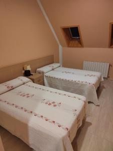 Ένα ή περισσότερα κρεβάτια σε δωμάτιο στο Hotel La Estrella de Castillejo