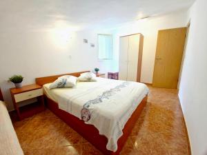 Postel nebo postele na pokoji v ubytování Apartment Jelena