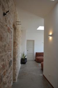 Posezení v ubytování B&B Fuga al Trullo