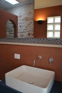 Koupelna v ubytování B&B Fuga al Trullo
