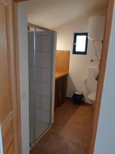 a bathroom with a shower and a toilet at RDJ Proche mer "L'Oustaou Cabriole" in Saint-Cyr-sur-Mer