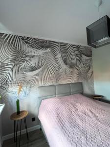 Postel nebo postele na pokoji v ubytování Apartament Wodna