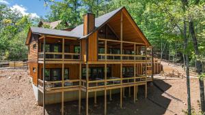 a wooden house under construction in the woods at Friends in High Places in Blue Ridge