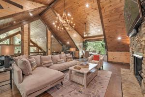 a living room with a couch and a fireplace at Friends in High Places in Blue Ridge