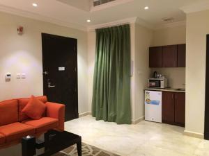 Kuchyň nebo kuchyňský kout v ubytování Asfar Plaza Hotel & Apartments