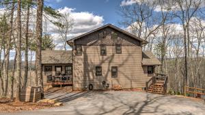 a house in the middle of the woods at The Perfect Landing in Cherry Log