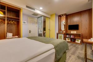 TV a/nebo společenská místnost v ubytování Sometimes Hotel Taksim