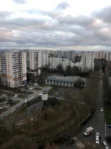 a view of a city with buildings and cars at Creteil new 1 in Créteil +4 photos