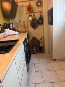 a kitchen with a counter and a dishwasher at Magnifique appartement avec une très belle vue in Marseille