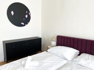 Postel nebo postele na pokoji v ubytování Arch Apartment in Třebíč