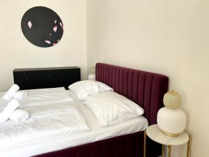 Postel nebo postele na pokoji v ubytování Arch Apartment in Třebíč