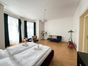 Postel nebo postele na pokoji v ubytování Arch Apartment in Třebíč