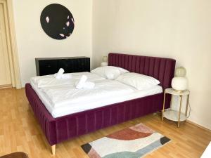 Postel nebo postele na pokoji v ubytování Arch Apartment in Třebíč