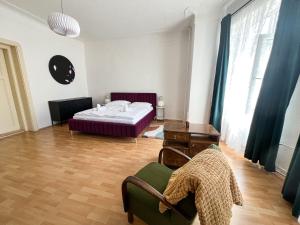 Postel nebo postele na pokoji v ubytování Arch Apartment in Třebíč