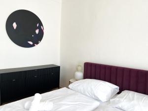 Postel nebo postele na pokoji v ubytování Arch Apartment in Třebíč
