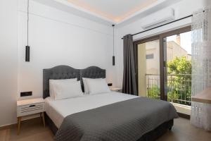 Voodi või voodid majutusasutuse Zante Center Suite A toas