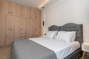 Voodi või voodid majutusasutuse Zante Center Suite A toas