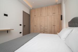 Voodi või voodid majutusasutuse Zante Center Suite A toas