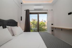 Voodi või voodid majutusasutuse Zante Center Suite A toas