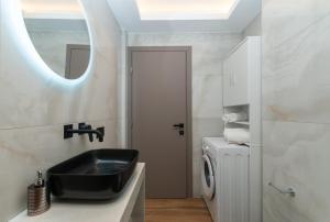 Vannituba majutusasutuses Zante Center Suite A