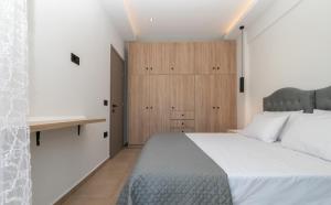 Voodi või voodid majutusasutuse Zante Center Suite A toas