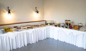 a long table with food on top of it at Park Hotel Cilento in Marina di Camerota