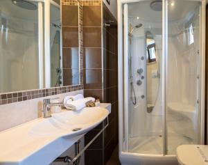 a bathroom with a sink and a shower at Park Hotel Cilento in Marina di Camerota