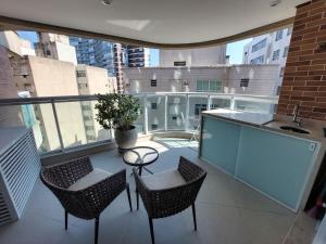 Μπαλκόνι ή βεράντα στο Book Santos Estanconfor 905 Charmoso Ap Executivo quadra praia