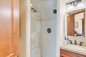 a bathroom with a shower and a sink at Lodge at Lionshead 310 in Vail