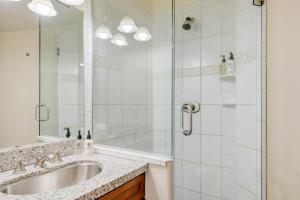 a bathroom with a sink and a shower at Lodge at Lionshead 310 in Vail