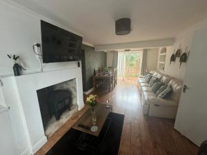 Et opholdsområde på Woodman House- 7 Bedrooms - Sleeps 14