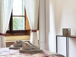 Postel nebo postele na pokoji v ubytování A Casa Dei Nonni
