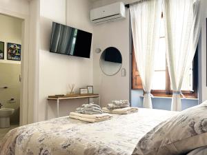 Postel nebo postele na pokoji v ubytování A Casa Dei Nonni