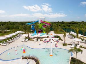 a pool at a resort with a water park at Nickelodeon Hotels & Resorts Punta Cana - Gourmet All Inclusive by Karisma in Punta Cana