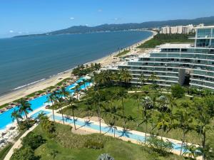 an aerial view of a resort and the beach at Peninsula Nuevo Vallarta in Mezcales