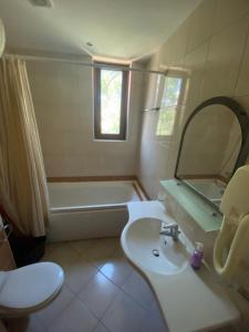 Ванная комната в Central Beach Apartament