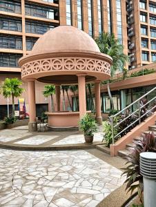a gazebo in the middle of a building at 100 Service suites At Times Square KL in Kuala Lumpur
