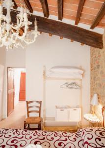 Posteľ alebo postele v izbe v ubytovaní Casa Raffaella 2 Tuscan charm in medieval Suvereto