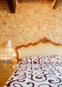 Posteľ alebo postele v izbe v ubytovaní Casa Raffaella 2 Tuscan charm in medieval Suvereto
