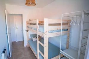 a couple of bunk beds in a room at Ondas do Mar Boutique Stays - Portonovo 4 in Portonovo