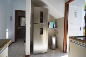 Köök või kööginurk majutusasutuses Nomad Mole - Praia Mole Beachfront Condo +16 fotot