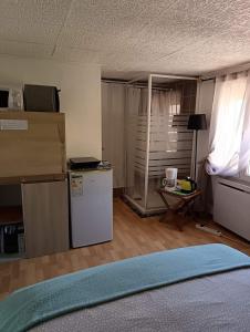 Dapur atau dapur kecil di chambre atypique entre mer et collines
